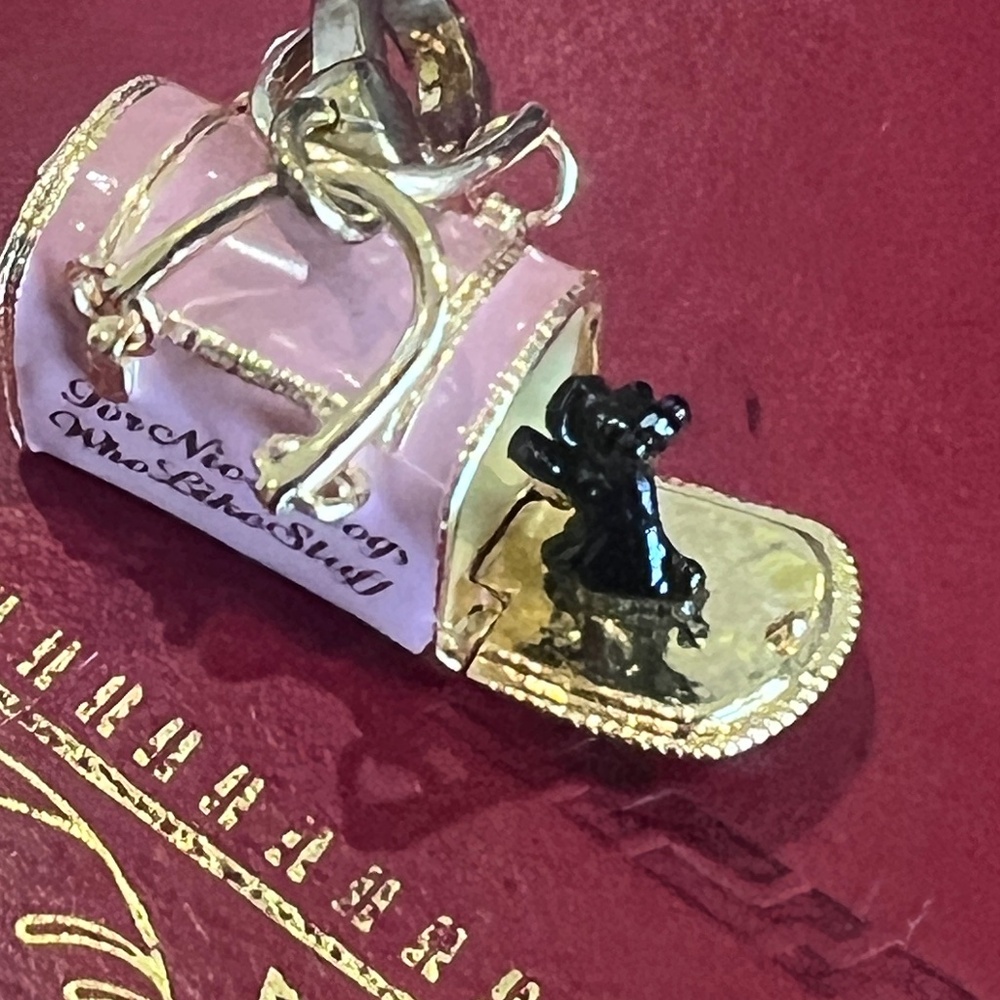 Juicy Couture Dog Carrier Charm, doggy door opens and dog comes out